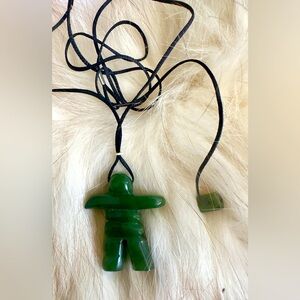 Jade inukshuk pendant on necklace